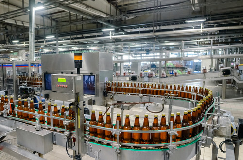 conveyor bottle filling in factory